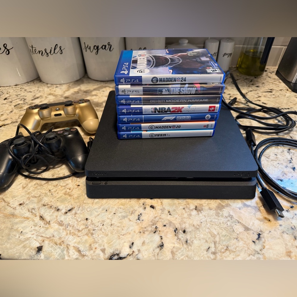 PlayStation PS4 Console with Gold and Black Controllers and 7 Physical Games